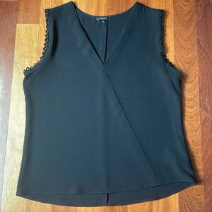 Stella and Dot sleeveless black blouse. Cute embroidered sleeves. Large